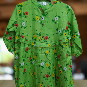 A charming green floral khaddar frock designed for little girls, offering warmth, comfort, and a premium winter look perfect for everyday wear and special moments.